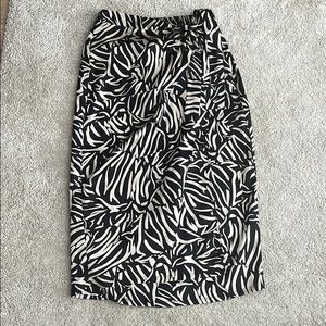 Black and cream patterned satin-like skirt